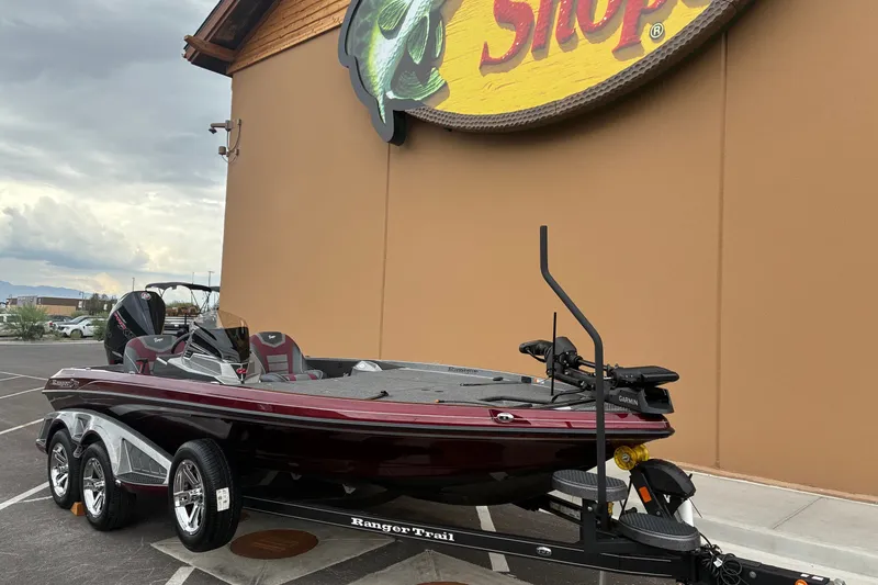 The Image of 2026 Ranger Z520 boat on trailer outside a shop, showcasing sleek design and modern features. - 0