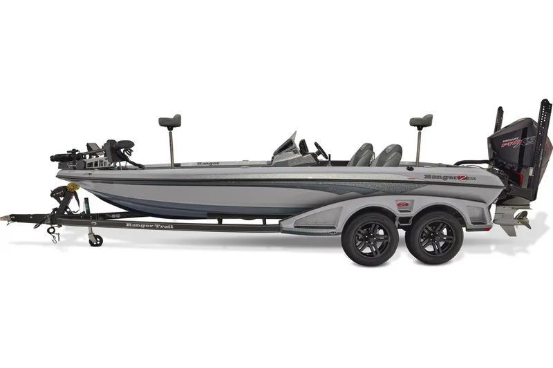 Slide: The Image of 2026 Ranger Z520 boat on trailer in parking lot, under clear sky. - 3