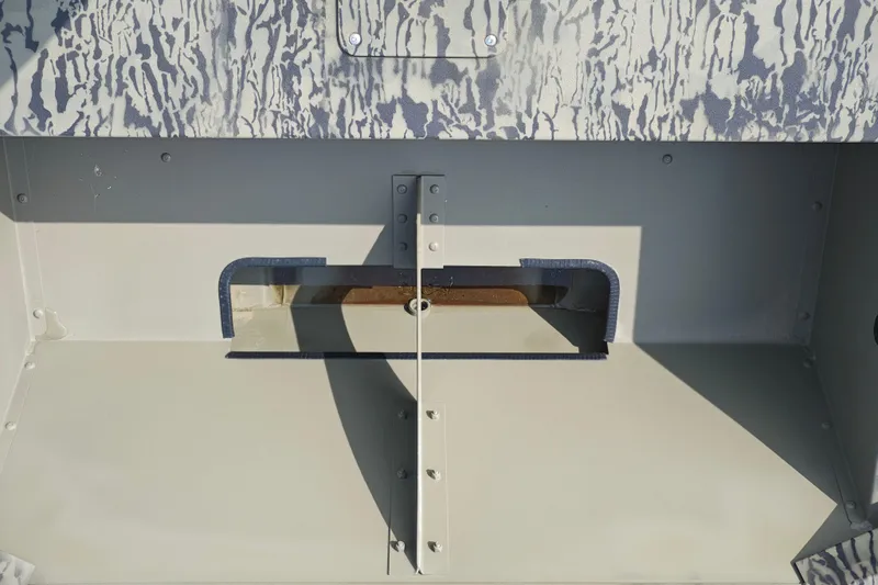Slide: The Image of Interior view of 2026 Tracker Grizzly 1648 Utility boat, showcasing metal construction details. - 12