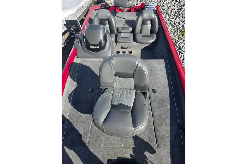 Slide: The Image of 2019 Tracker Pro Team 190 TX Tournament Edition boat interior with gray seating. - 14