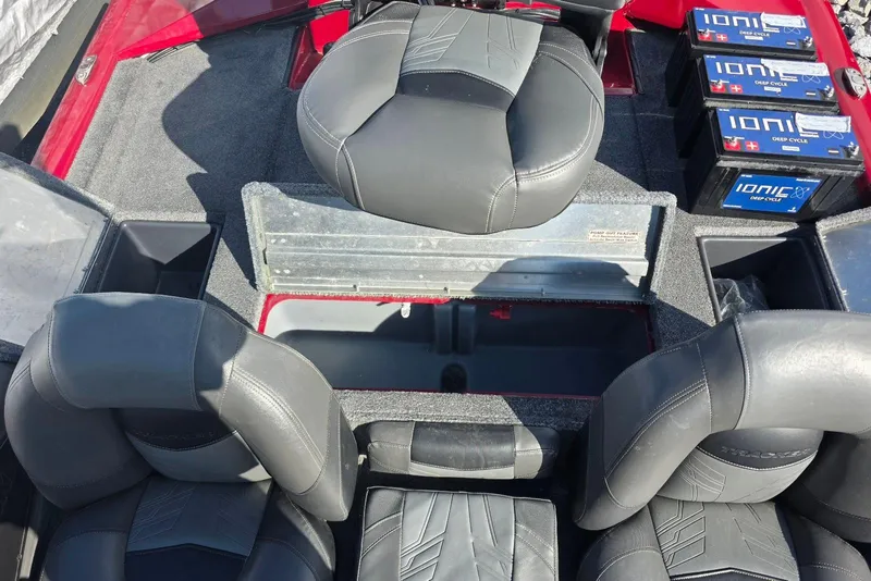 Slide: The Image of 2019 Tracker Pro Team 190 TX Tournament Edition boat interior with seating and Ionic deep cycle batteries. - 19