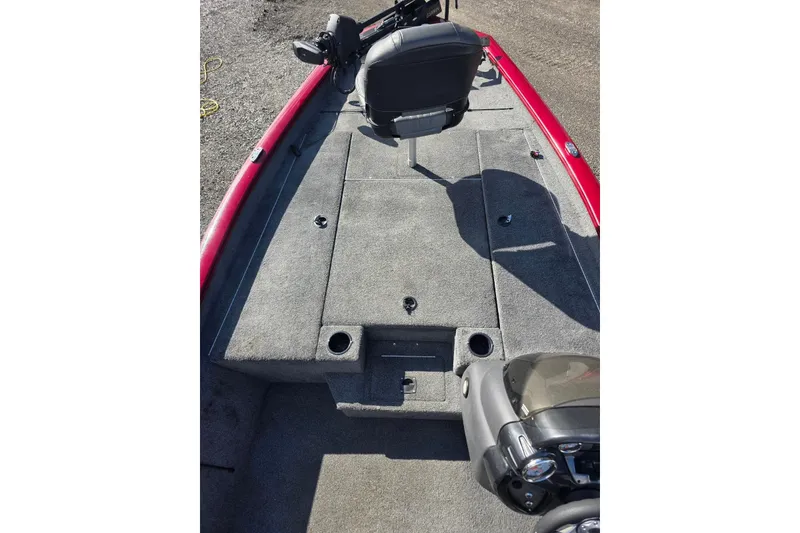 Slide: The Image of 2019 Tracker Pro Team 190 TX Tournament Edition boat interior with gray carpet and seating. - 9