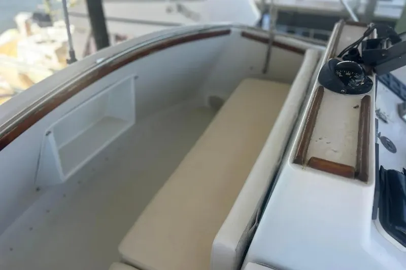 Slide: The Image of 1978 Chris-Craft 45 Commander boat interior with seating and navigation compass. - 11