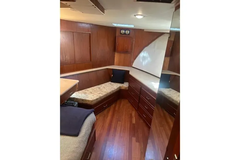 Slide: The Image of Interior of 1978 Chris-Craft 45 Commander with wood paneling and built-in seating. - 25