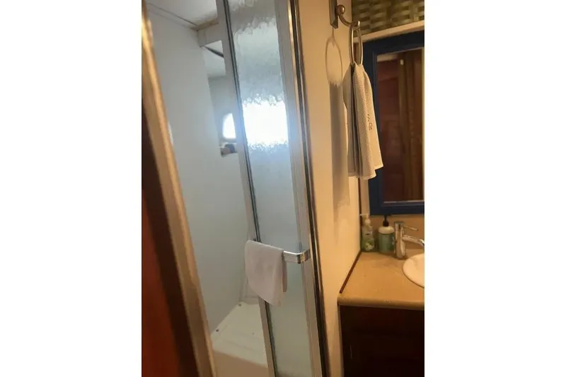 Slide: The Image of Bathroom interior of 1978 Chris-Craft 45 Commander yacht with shower and sink. - 31