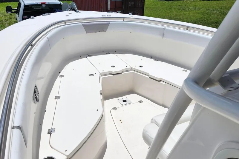 Slide: The Image of 2015 Robalo R300 Center Console boat deck, spacious and well-maintained. - 22