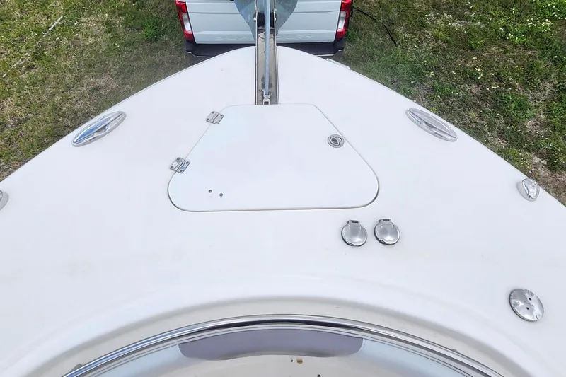 Slide: The Image of 2015 Robalo R300 Center Console boat bow with hatch and fittings. - 29