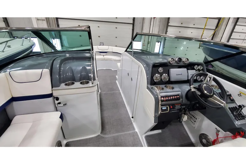 Slide: The Image of 2013 Formula 310 Bowrider interior with modern dashboard and seating. - 23