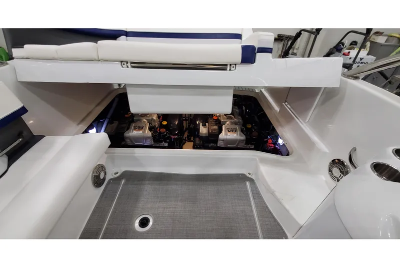 Slide: The Image of 2013 Formula 310 Bowrider engine compartment with V8 engines visible. - 31