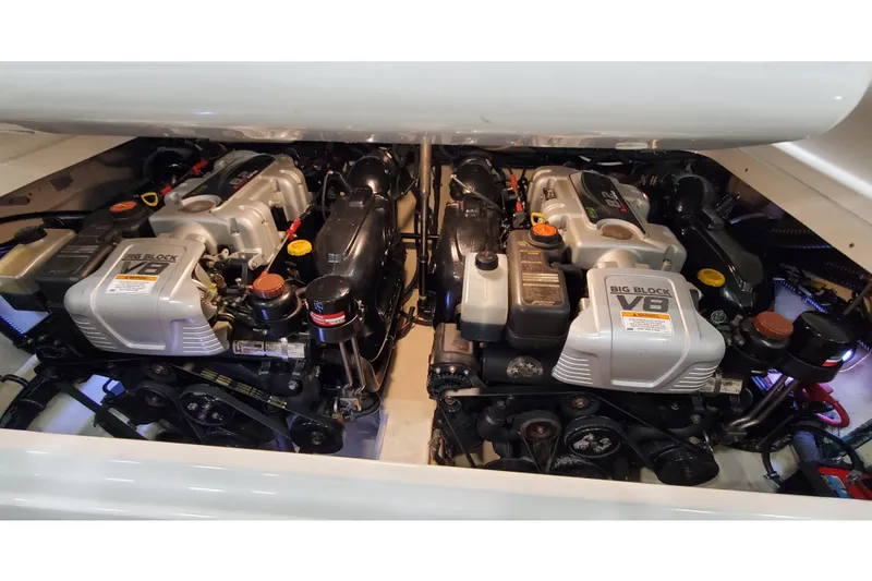 Slide: The Image of Twin V8 engines in a 2013 Formula 310 Bowrider boat engine compartment. - 37