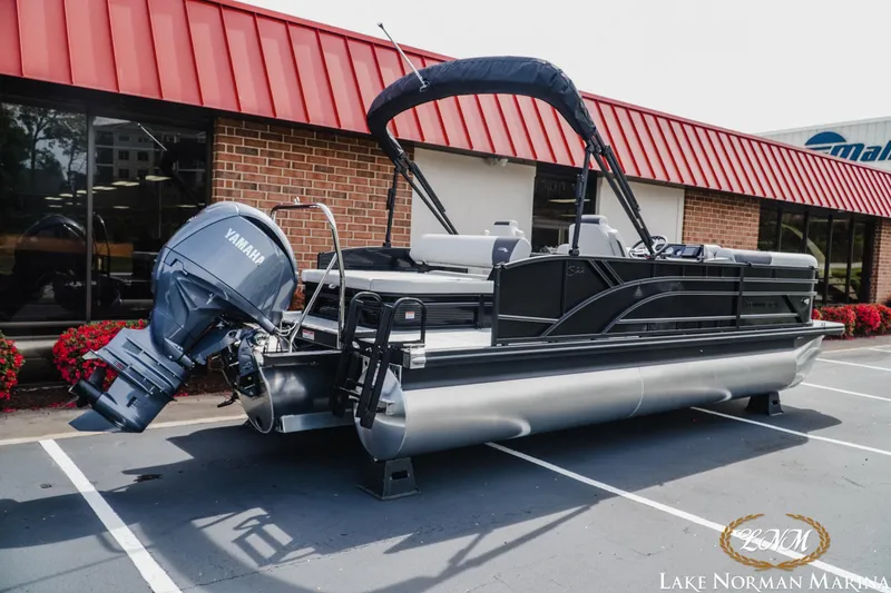 Slide: The Image of 2026 Bennington 22SSB pontoon boat with Yamaha engine at Lake Norman Marina. - 3