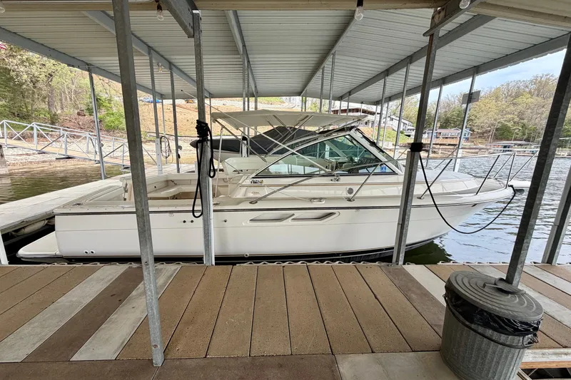 The Image of 2000 Tiara Yachts 2900 Coronet docked under covered marina. - 0