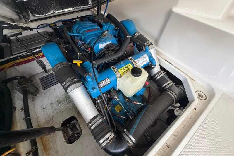 Slide: The Image of Engine compartment of a 2000 Tiara Yachts 2900 Coronet, showcasing detailed mechanical components. - 39