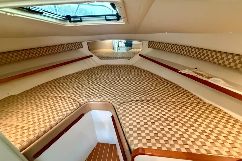 Slide: The Image of Interior cabin of 2000 Tiara Yachts 2900 Coronet with checkered upholstery. - 43