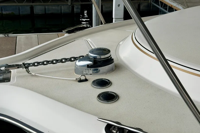 Slide: The Image of Deck of 2000 Tiara Yachts 2900 Coronet with anchor chain and winch. - 8