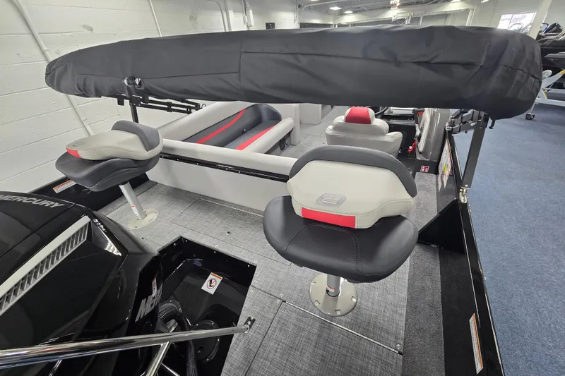 Slide: The Image of 2026 Princecraft Ventura 224 boat interior with seating and Mercury engine. - 13