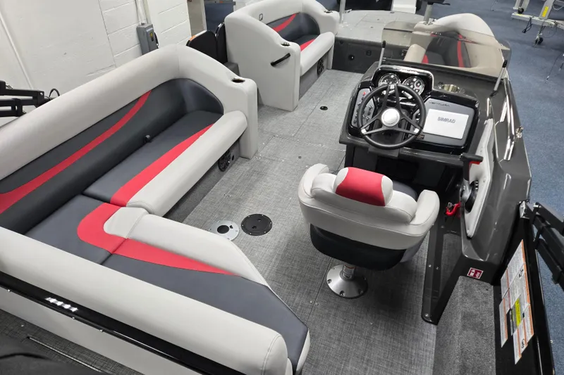 Slide: The Image of Interior of 2026 Princecraft Ventura 224 boat with modern seating and control console. - 14