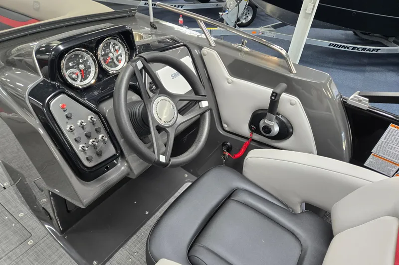 Slide: The Image of Steering console of 2026 Princecraft Ventura 224 boat with gauges and controls. - 15