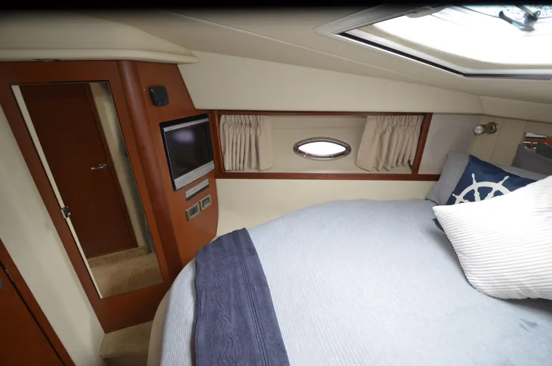Slide: The Image of Shower area in 2007 Sea Ray 38 Sundancer yacht with porthole and fixtures. - 21