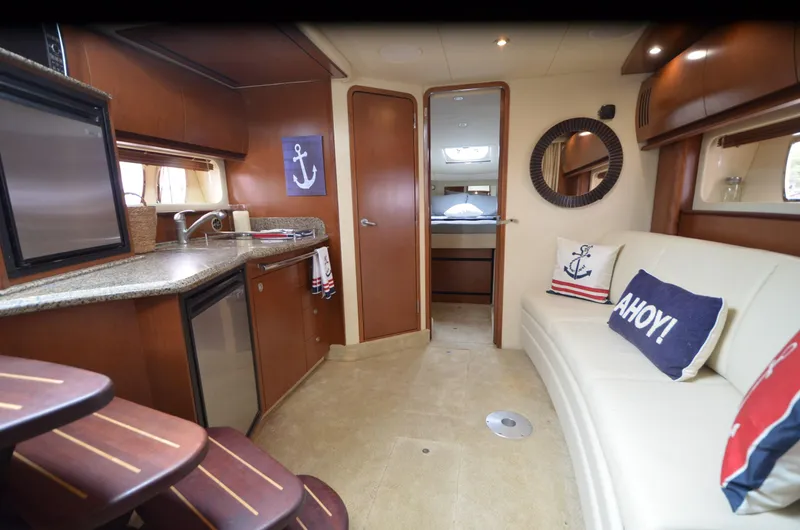 Slide: The Image of 2007 Sea Ray 38 Sundancer bathroom with granite countertop and nautical decor. - 22