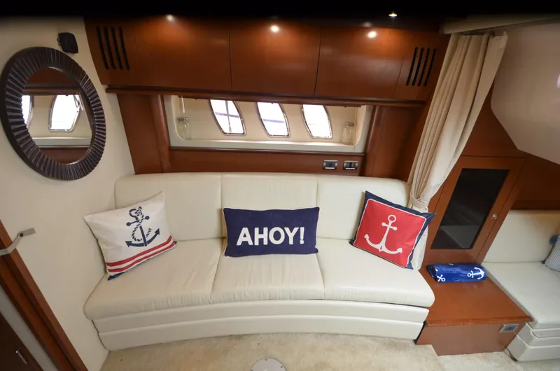 Slide: The Image of 2007 Sea Ray 38 Sundancer yacht interior with kitchenette and bathroom. - 29
