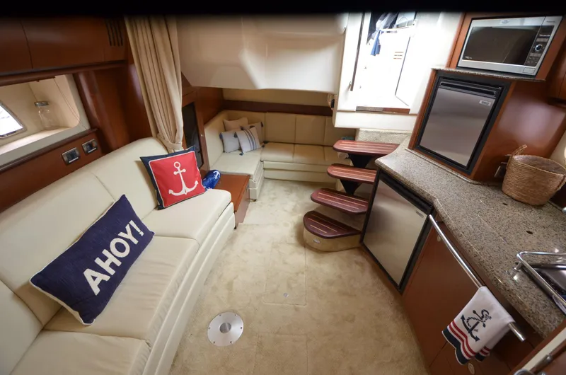 Slide: The Image of Engine room of 2007 Sea Ray 38 Sundancer with twin Mercury engines. - 30