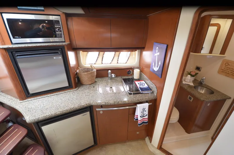 Slide: The Image of Engine compartment of 2007 Sea Ray 38 Sundancer with MerCruiser 8.1S Horizon engine. - 33