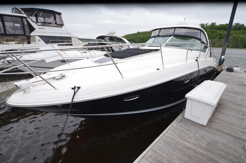 Slide: The Image of 2007 Sea Ray 38 Sundancer yacht interior with elegant seating and nautical decor. - 39