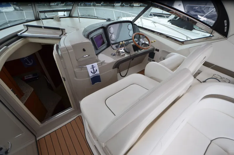 Slide: The Image of 2007 Sea Ray 38 Sundancer yacht interior with sink and mini fridge. - 8