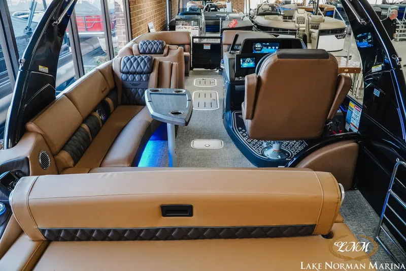 Slide: The Image of Luxurious interior of 2026 Bennington 25QSBA pontoon boat at Lake Norman Marina. - 10
