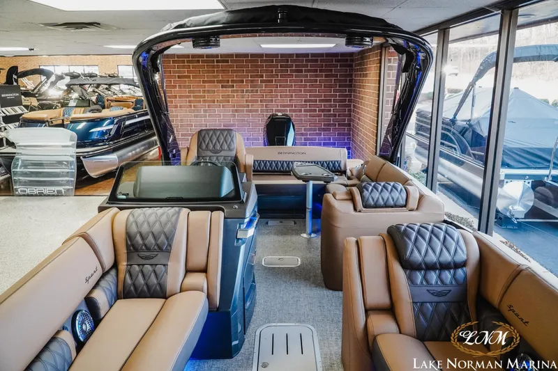 Slide: The Image of Luxurious interior of 2026 Bennington 25QSBA pontoon boat at Lake Norman Marina. - 5