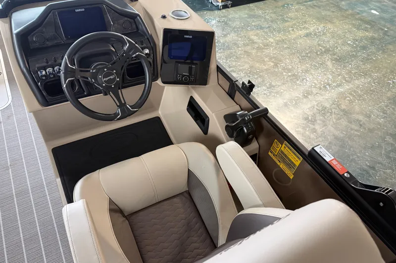 Slide: The Image of Interior view of 2026 Bentley Pontoons 253 Elite Swingback Dual Capt EXT helm station. - 15