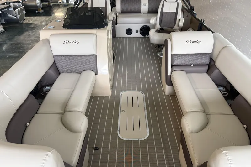 Slide: The Image of 2026 Bentley Pontoons 253 Elite Swingback Dual Capt EXT interior with luxurious seating. - 7