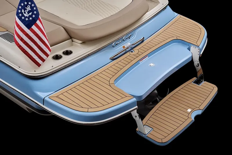 Slide: The Image of Manufacturer Provided Image: 2025 Chris-Craft Sportster 25 boat stern with swim platform and American flag. - 11