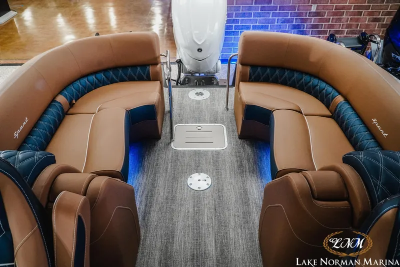 Slide: The Image of Luxurious interior of 2026 Bennington 25QXFBA boat with plush seating at Lake Norman Marina. - 14