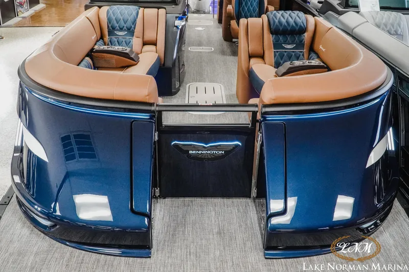 Slide: The Image of 2026 Bennington 25QXFBA pontoon boat with luxurious seating at Lake Norman Marina. - 8