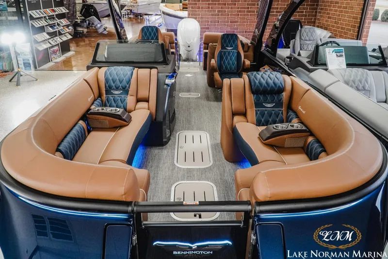 Slide: The Image of 2026 Bennington 25QXFBA pontoon boat with luxurious seating and modern design at Lake Norman Marina. - 9