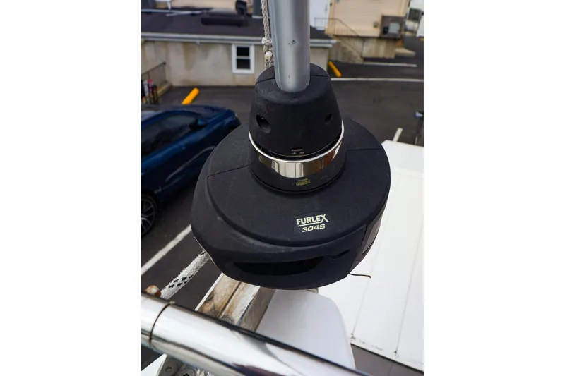 Slide: The Image of Furlex 304S furler on 2019 Hanse 418 sailboat, docked in a marina. - 17