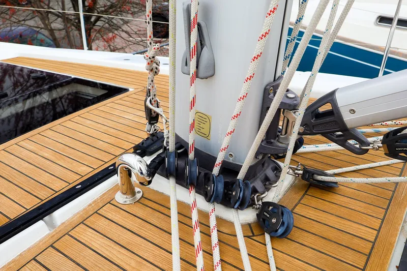 Slide: The Image of Deck of 2019 Hanse 418 sailboat with rigging and wooden finish. - 18