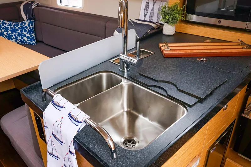 Slide: The Image of Modern kitchen interior of 2019 Hanse 418 yacht with dual sink and stylish decor. - 35