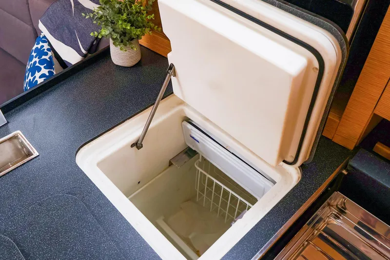 Slide: The Image of Open refrigerator in 2019 Hanse 418 yacht kitchen with countertop and plant. - 36