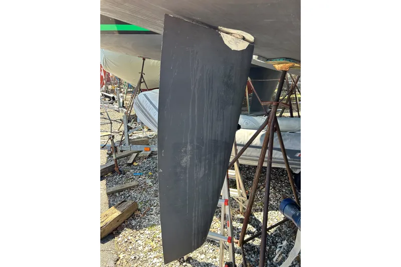 Slide: The Image of Damaged rudder of 2019 Hanse 418 sailboat on dry dock. - 53