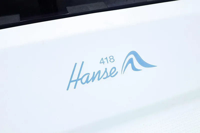 Slide: The Image of Close-up of 2019 Hanse 418 logo on white surface. - 55