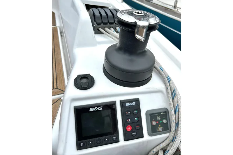 Slide: The Image of Control panel and winch on a 2019 Hanse 418 sailboat deck. - 6