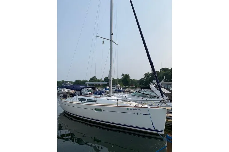 The Image of 2007 Jeanneau Sun Odyssey 36i sailboat docked in a marina. - 1