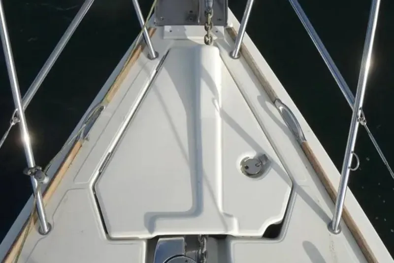 Slide: The Image of Bow of 2007 Jeanneau Sun Odyssey 36i sailboat with anchor chain and deck fittings. - 10