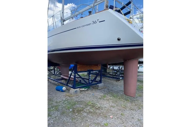 Slide: The Image of 2007 Jeanneau Sun Odyssey 36i sailboat on stands, hull view. - 26
