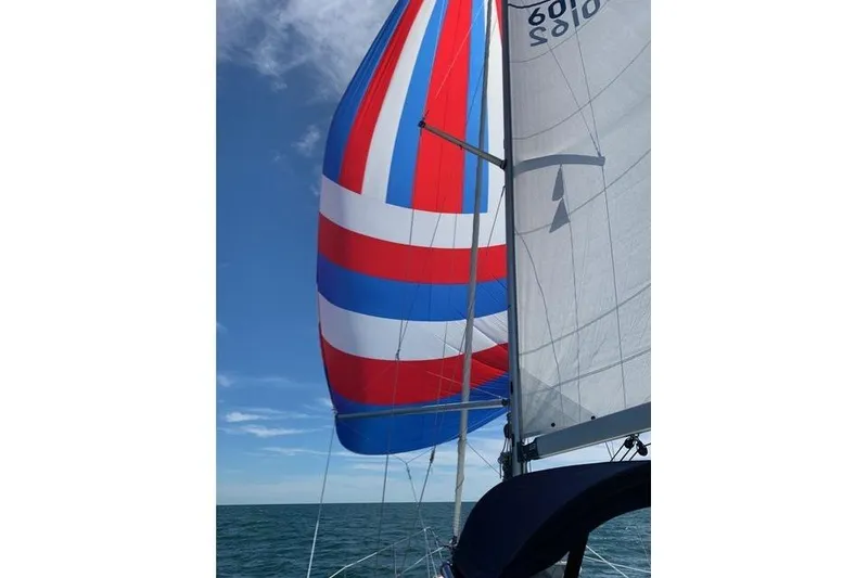 Slide: The Image of Jeanneau Sun Odyssey 36i sailing with colorful spinnaker, 2007 model. - 6