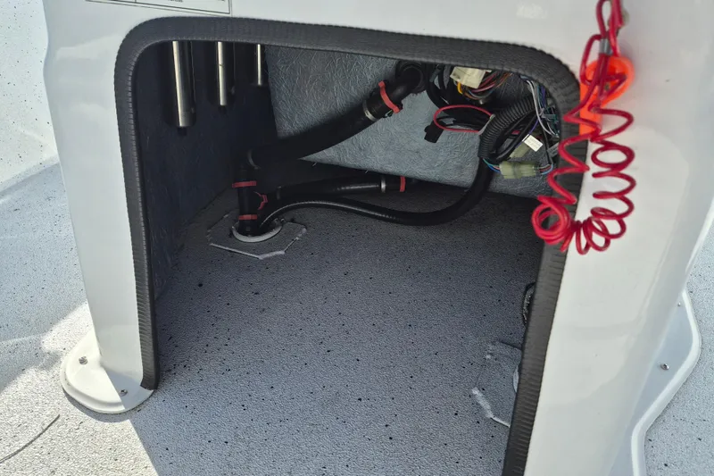 Slide: The Image of 2021 Xpress XP20CC boat interior wiring and tubing detail. - 12
