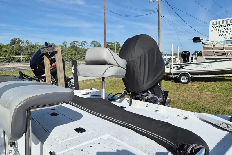 Slide: The Image of 2021 Xpress XP20CC boat with Yamaha engine, featuring comfortable seating and outdoor display. - 5